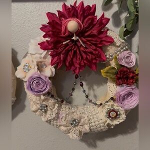 Floral Decorative Wreath with Red and Pink Accents